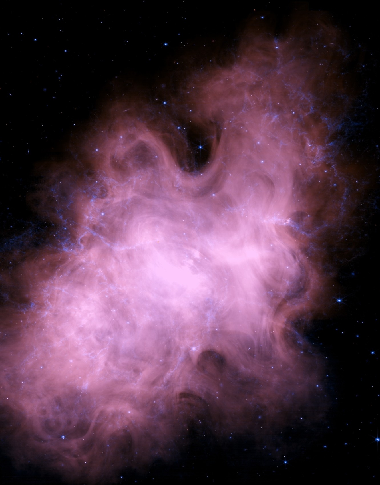 JWST's NIRCam view of the Crab Nebula, reprocessed by Kyle Eberly — a pink, filamentary cloud of gas laced with wispy blue-white threads and dark cavities, against a black sky.