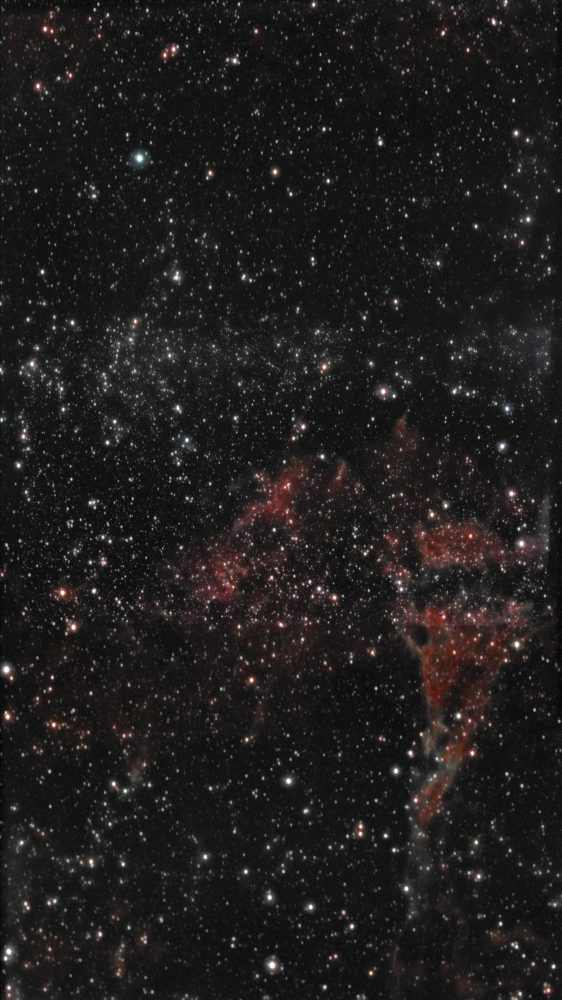 Full-frame view: Pickering's Triangle region of the Veil Nebula photographed from Lakeway, Texas with a ZWO Seestar S50 — faint gray-blue wisps of supernova remnant against a dense star field.